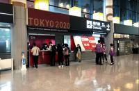 オリンピック関係者、一般帰国者